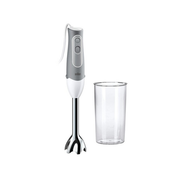 A Braun MultiQuick 5 MQ500 Soup hand blender with a white handle and grey accents, displayed alongside a clear plastic measuring cup.