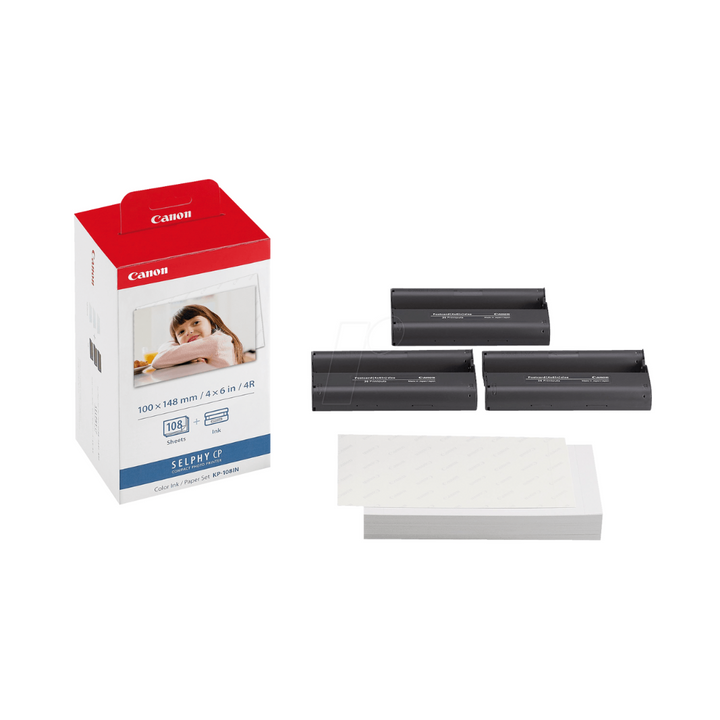Canon color Ink and paper set for printing set on a white background