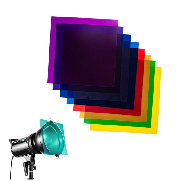 A set of colored filters in various colors displayed beside a studio light.