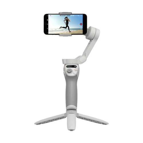 A DJI Osmo Mobile SE Smartphone Gimbal, featuring a magnetic phone clamp and various control buttons on the handle.