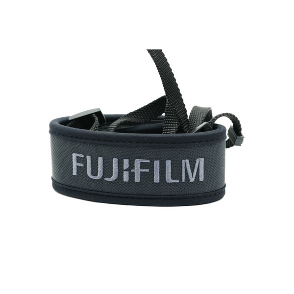 Black camera strap with Fujifilm logo on a white background
