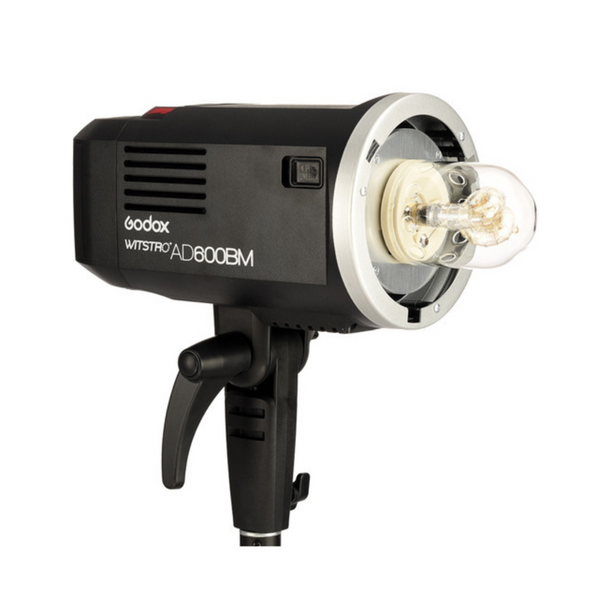 Godox AD600BM outdoor flash unit with a battery pack, primarily black in color with some silver accents.