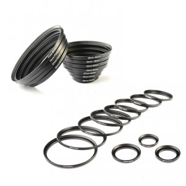 A set of black step up ring adapters for camera lenses, displayed in no specific order on a white background.