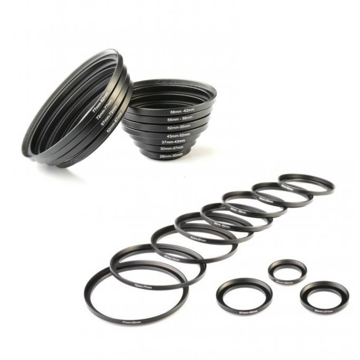 A set of black step up ring adapters for camera lenses, displayed in no specific order on a white background.
