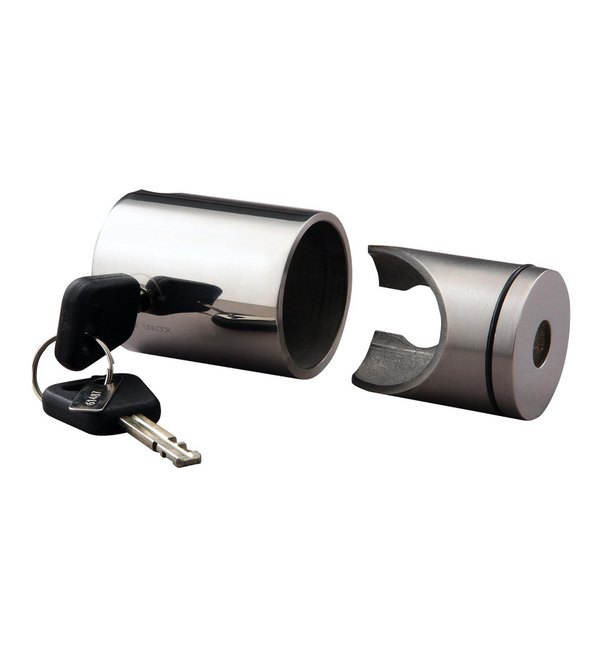 Metallic cylindrical lock with a key on a white background
