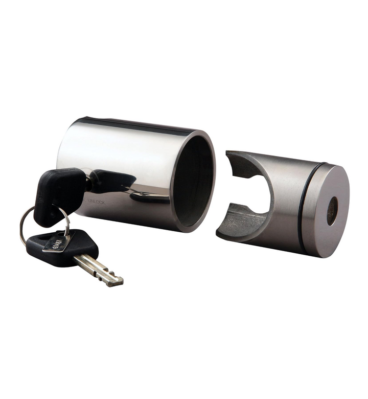 Metallic cylindrical lock with a key on a white background