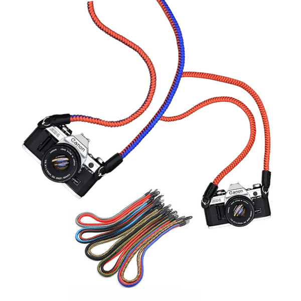 A paracord camera neck strap with orange and blue color stripes, including multiple buckles for camera mounting.