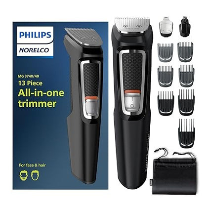 Philips Norelco 13-piece all-in-one trimmer kit for face and body grooming, model MG3740/40, with accessories displayed alongside the box.