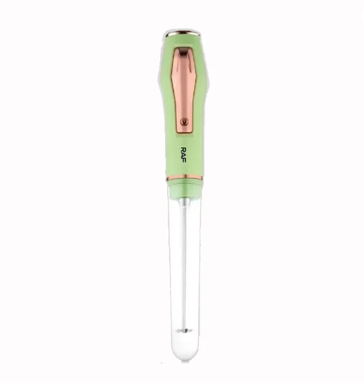 Green and rose gold handheld tool on a white background