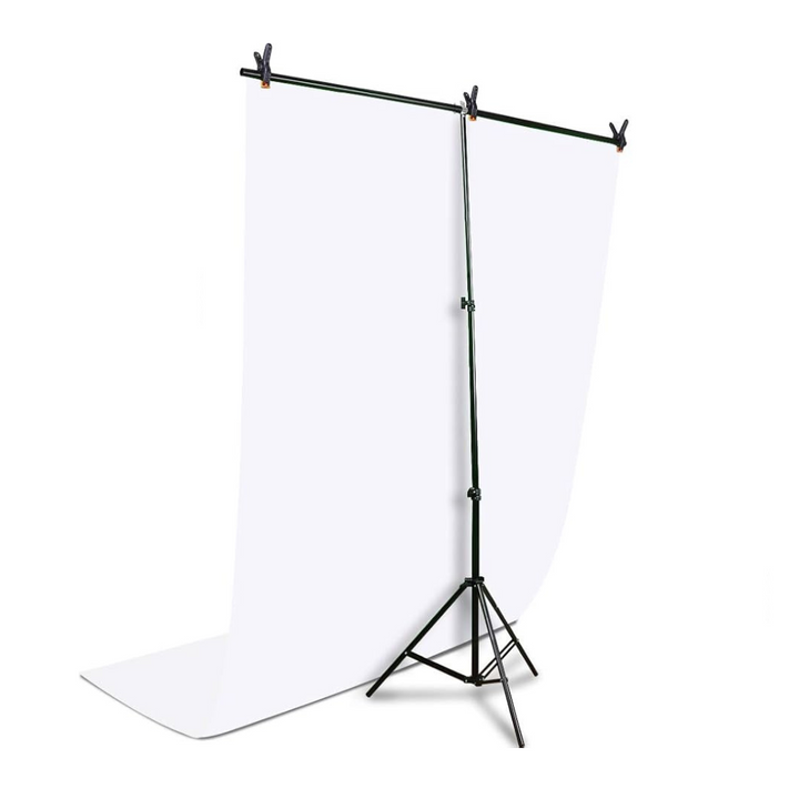A T-shaped mini background stand with a retractable tripod base and a white background cloth, used for product or infant photography.