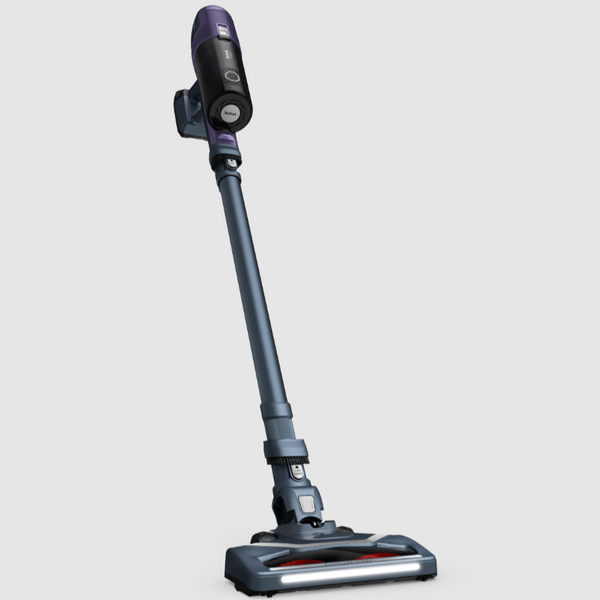 Gray and purple vacuum cleaner on a light gray background