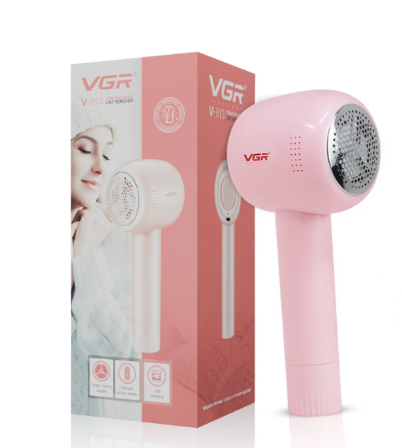 Pink fabric shaver with VGR branding next to its packaging on a white background